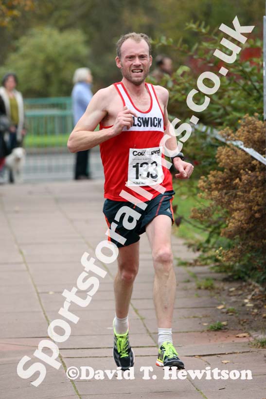 Lee Bennett (Elswick Harriers) finishing the Brampton to Carlisle 10 mile Road Race. Photo: David T. Hewitson/Sports for All Pics